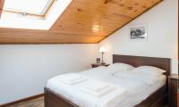 Posteľ alebo postele v izbe v ubytovaní Apartamenty Zdrojowa