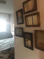 Posteľ alebo postele v izbe v ubytovaní Vacacional Candelaria vistas al mar con garaje gratuito