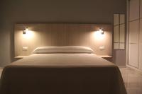 Posteľ alebo postele v izbe v ubytovaní Apartamentos Maro VG