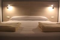 Posteľ alebo postele v izbe v ubytovaní Apartamentos Maro VG