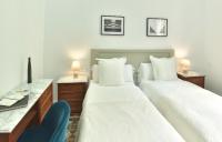 Postel nebo postele na pokoji v ubytování Hostal Girona