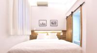 Postel nebo postele na pokoji v ubytování Hostal Girona