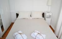 A bed or beds in a room at Villa "Pietra e Mare"