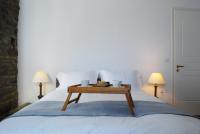A bed or beds in a room at Villa "Pietra e Mare"