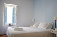 A bed or beds in a room at Villa "Pietra e Mare"