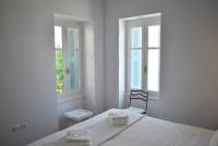 A bed or beds in a room at Villa "Pietra e Mare"