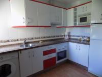 Kuchyň nebo kuchyňský kout v ubytování Apartamentos Las Llábanas