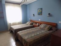 Postel nebo postele na pokoji v ubytování Apartamentos Las Llábanas