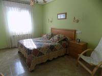 Postel nebo postele na pokoji v ubytování Apartamentos Las Llábanas
