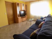 TV a/nebo společenská místnost v ubytování Apartamentos Las Llábanas