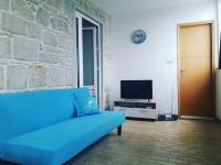 Televízia a/alebo spoločenská miestnosť v ubytovaní Jozefina Apartment