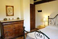 Posteľ alebo postele v izbe v ubytovaní Villa di Castello