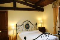 Posteľ alebo postele v izbe v ubytovaní Villa di Castello