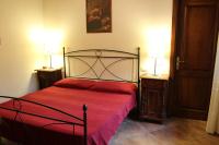 Posteľ alebo postele v izbe v ubytovaní Villa di Castello