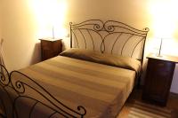 Posteľ alebo postele v izbe v ubytovaní Villa di Castello