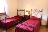 Posteľ alebo postele v izbe v ubytovaní Villa di Castello