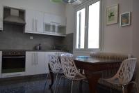 Kuchyň nebo kuchyňský kout v ubytování Asimelia Luxury Apartment