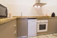 Kuchyňa alebo kuchynka v ubytovaní Can Pauet Apartaments