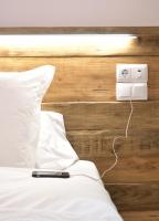 Postel nebo postele na pokoji v ubytování Hostal Girona