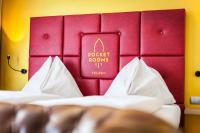 Posteľ alebo postele v izbe v ubytovaní Rocket Rooms Velden
