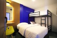 Postel nebo postele na pokoji v ubytování Tuk Tuk Hostel