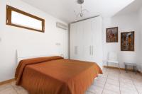 A bed or beds in a room at Albergo San Remo