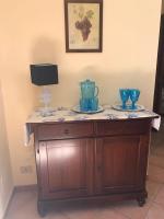 A television and/or entertainment centre at Favignana Margot House