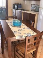 A kitchen or kitchenette at Favignana Margot House