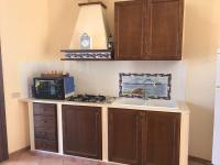 A kitchen or kitchenette at Favignana Margot House
