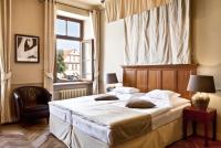 a bedroom with a large bed and a window at Boutique Hotel Nautilus in Tábor