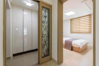Home Fourest Residence Hotel Okpoにあるベッド