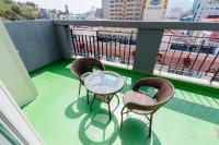 Home Fourest Residence Hotel Okpoにあるバルコニーまたはテラス