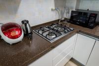 Home Fourest Residence Hotel Okpoにあるキッチンまたは簡易キッチン