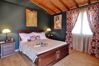 Posteľ alebo postele v izbe v ubytovaní Nicolas Beach House
