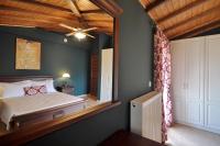 Posteľ alebo postele v izbe v ubytovaní Nicolas Beach House