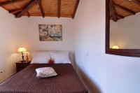 Posteľ alebo postele v izbe v ubytovaní Nicolas Beach House