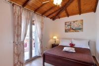 Posteľ alebo postele v izbe v ubytovaní Nicolas Beach House