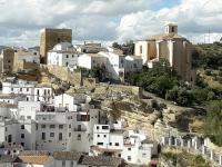 a group of white houses on a mountain at El Palacete in Setenil