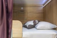 Postel nebo postele na pokoji v ubytování Apartments in city center Ventus