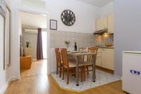 Kuchyň nebo kuchyňský kout v ubytování Apartments in city center Ventus