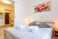 Postel nebo postele na pokoji v ubytování Apartments in city center Ventus