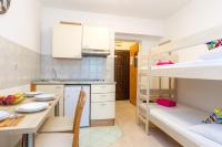 Kuchyň nebo kuchyňský kout v ubytování Apartments in city center Ventus