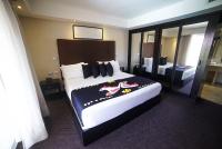 Postel nebo postele na pokoji v ubytování Savoy Hotel Boutique