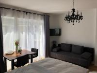 A bed or beds in a room at Enjoyit Rooms