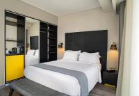 Posteľ alebo postele v izbe v ubytovaní Hotel Lozenge