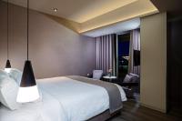 Posteľ alebo postele v izbe v ubytovaní Hotel Lozenge