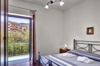 Posteľ alebo postele v izbe v ubytovaní Caruso 4 by Villasandco RentalSorrento