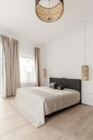 A bed or beds in a room at Schloss Pesenbach Chalet im Freizeitland Feldkirchen an der Donau
