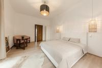 A bed or beds in a room at Schloss Pesenbach Chalet im Freizeitland Feldkirchen an der Donau