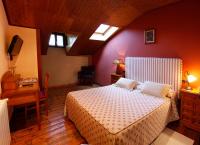 Postel nebo postele na pokoji v ubytování Hotel Villa de Luarca